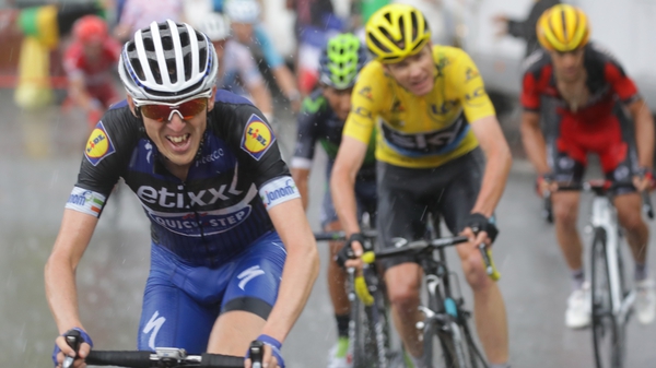 Dan Martin (L) is just 19 seconds behind race leader Chris Froome (yellow)
