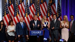 US Republican presidential candidate Donald Trump (C-R) stands with his newly selected vice presidential running mate Mike Pence, governor of Indiana (C-L) at the New York Hilton Hotel Grand Ballroom in New York