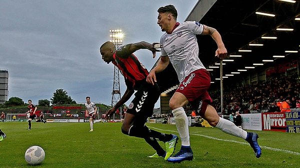 Bohemians' Ismail Akinade with Armin Aganovic of Galway United