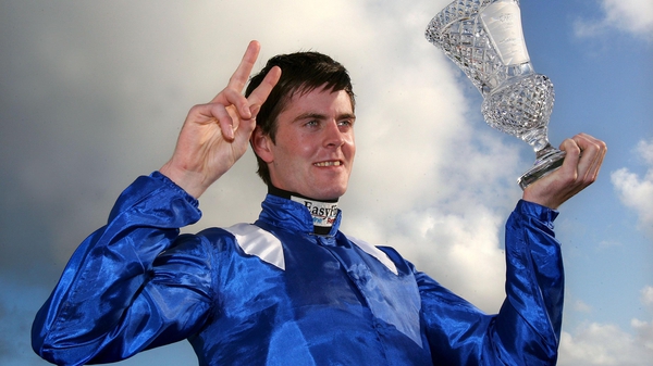 Robbie McNamara, who saddles Chadic in Monday's feature, celebrates his win on Ghimaar in the same race back in 2009
