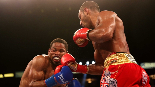 Kell Brook lands a punch against Shawn Porter