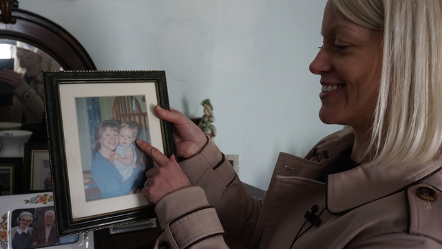 Kathriona Devereux admiring childhood photographs