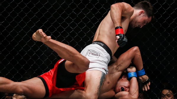 Jordan Lucas of Australia fights Edward Kelly of Philippines in an MMA One event in Myanmar