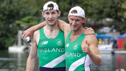 Gary and Paul O'Donovan celebrate their historic silver medal