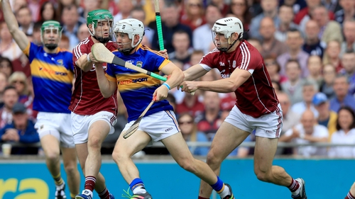 Tipperary's Niall O'Meara with Adrian Touchy and John Hanbury of Galway