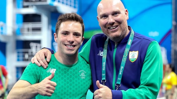 Ireland's Oliver Dingley (L) with his coach Damian Bell