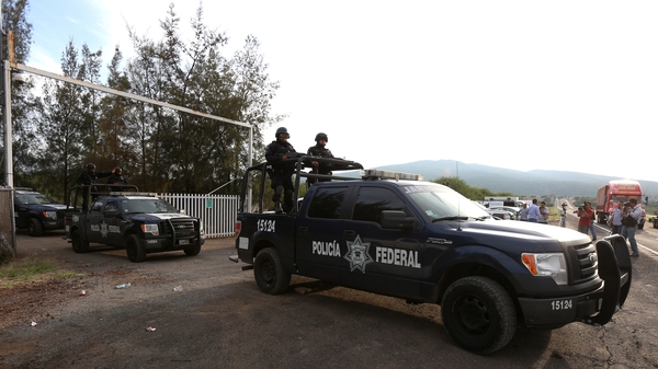 Federal Police leaving the ranch del Sol in 2015 after a confrontation which ended with 43 people dead
