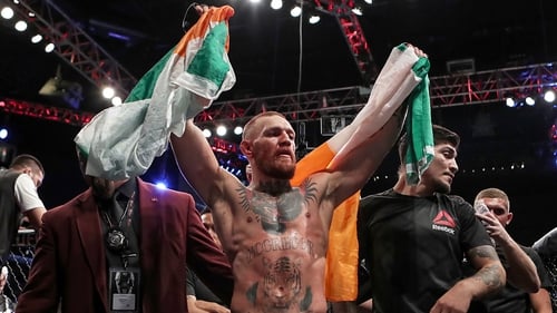 Conor McGregor celebrates victory over Nate Diaz