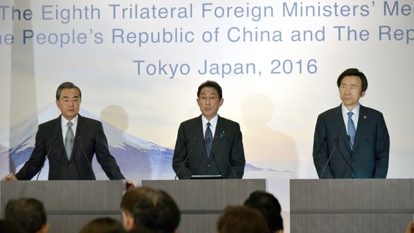Wang Li (left) was speaking after a meeting with his Japanese and Korean counterparts