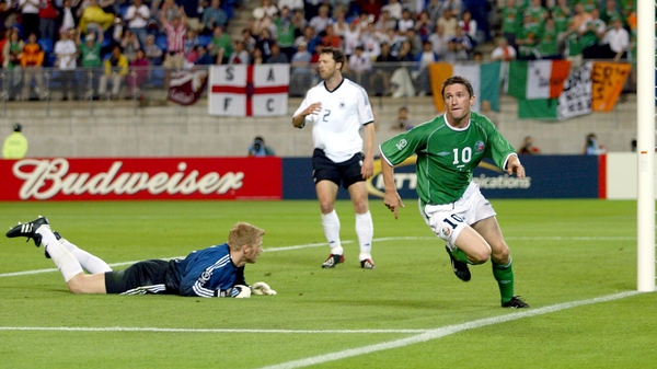 Robbie Keane wheels away after scoring the dramatic equaliser in the 1-1 draw against Germany at the 2002 World Cup