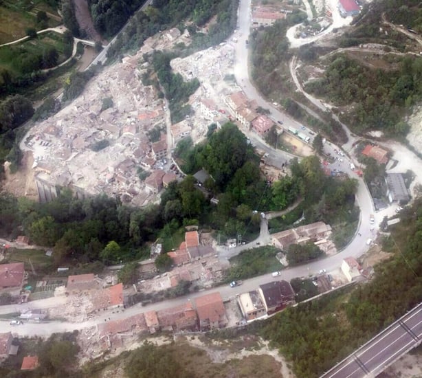 Aerial view of collapsed buildings in Pescara del Tronto, central Italy