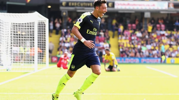 Ozil celebrates Arsenal's third goal against Watford