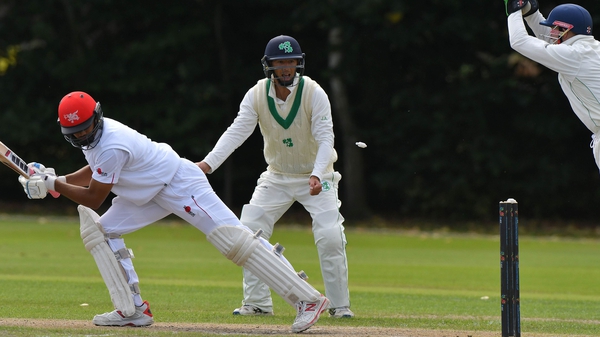 Ireland wicket-keeper Niall O'Brien goes for an attempted stumping against Ninad Shah of Hong Kong