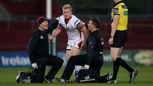 Ulster's Stuart Olding struggles to his feet after picking up a suspected concussion in a Pro12 game