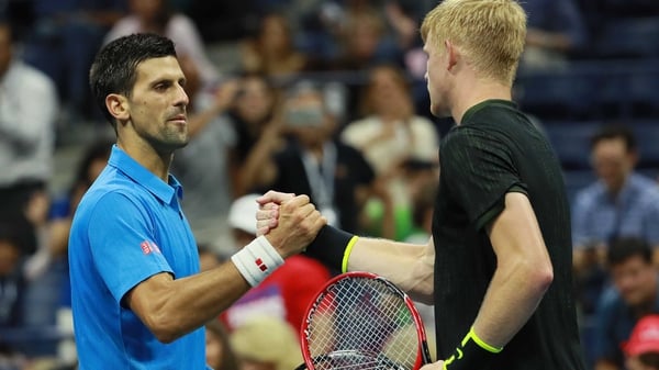 Novak Djokovic of Serbia shakes hands after Kyle Edmund