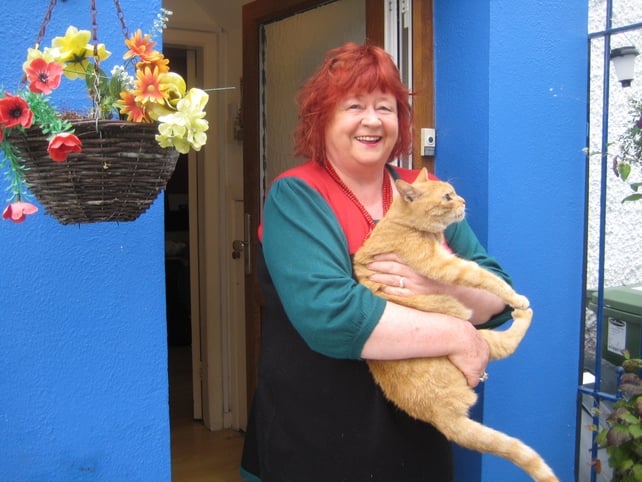 Clíona and her cat Rua are prepared to uproot