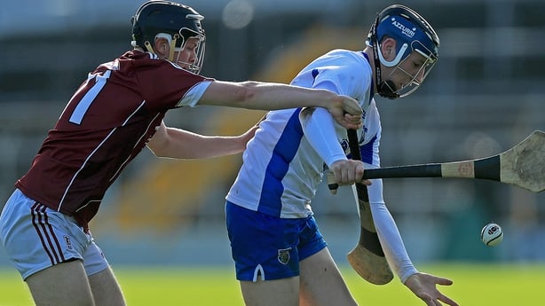 Waterford's Shane Bennett with Brian Molloy of Galway