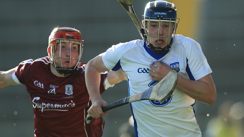 Galway's Conor Whelan with Shane Bennett of Waterford