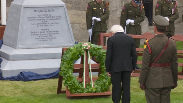President Higgins lays a wreath at new famine memorial