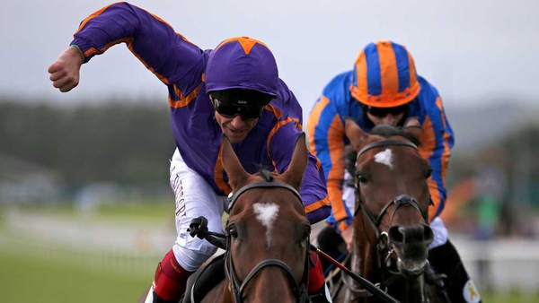 Wicklow Brave and Frankie Dettori (L) upset the odds at the Curragh