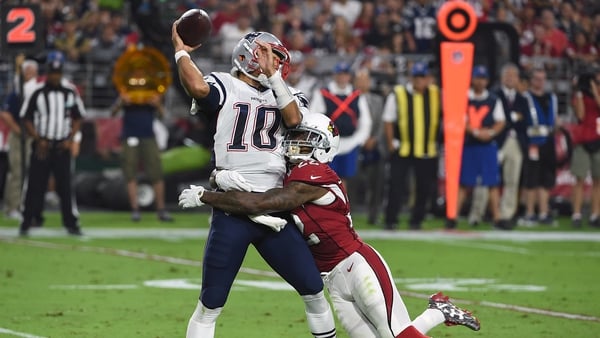 Jimmy Garoppolo comes under pressure against the Arizona Cardinals