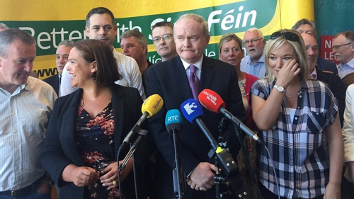 Martin McGuinness alongside fellow SF elected representatives at its party gathering