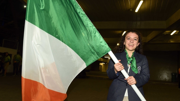 Nicole Turner prepares to carry out the Irish flag at the Rio Paralympics closing ceremony