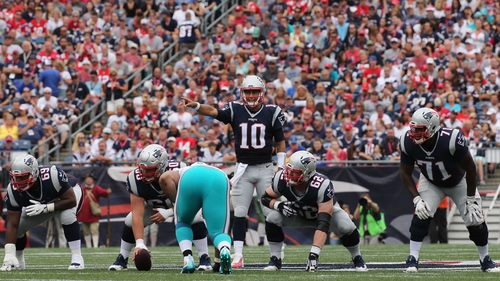 Jimmy Garoppolo #10 of the New England Patriots communicates at the line of scrimmage