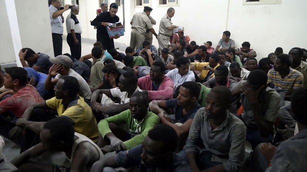 Survivors are seen in a police station north of Cairo