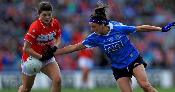 Cork's Marie Ambrose with Niamh McEvoy of Dublin in action in the senior decider