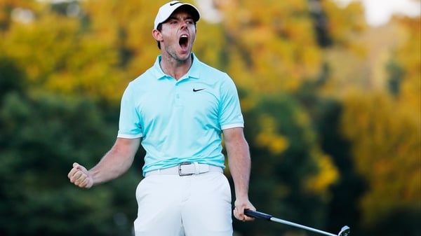 Rory McIlroy celebrates winning the TOUR Championship and FedExCup