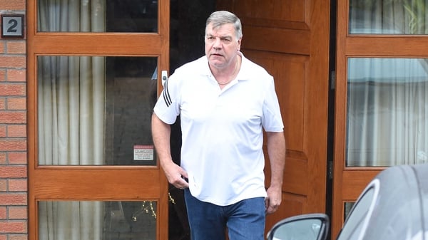 Sam Allardyce emerges from his home in Bolton this morning