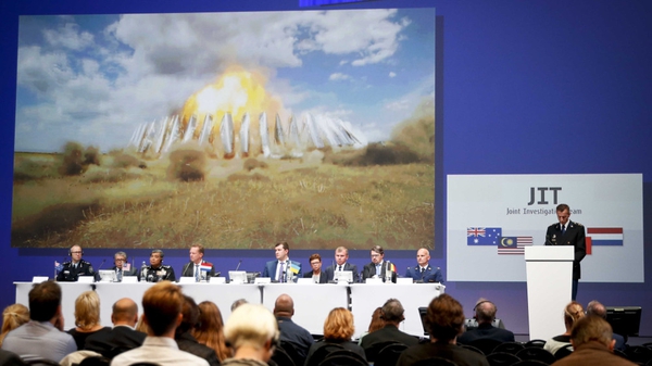 Members of the Joint Investigation Team present their findings in the MH17 report at the NBC Congress centre in Nieuwegein