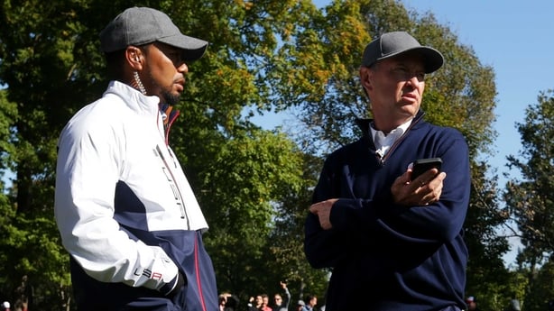 Tiger Woods and Davis Love