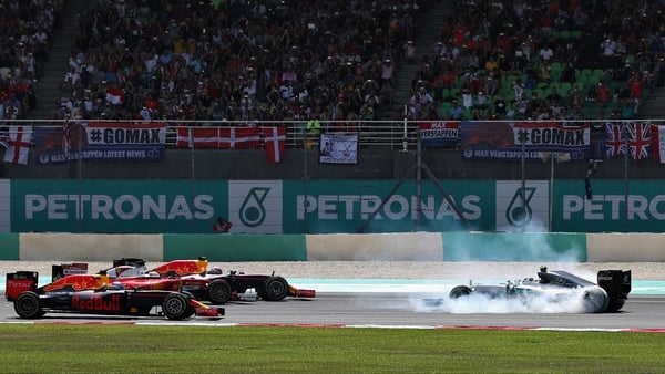 Nico Rosberg spins in front of Daniel Ricciardo, Sebastian Vettel and Max Verstappen