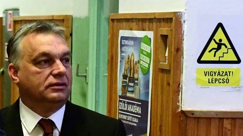 Hungarian Prime Minister Viktor Orban leaves a polling station in Budapest after casting his vote
