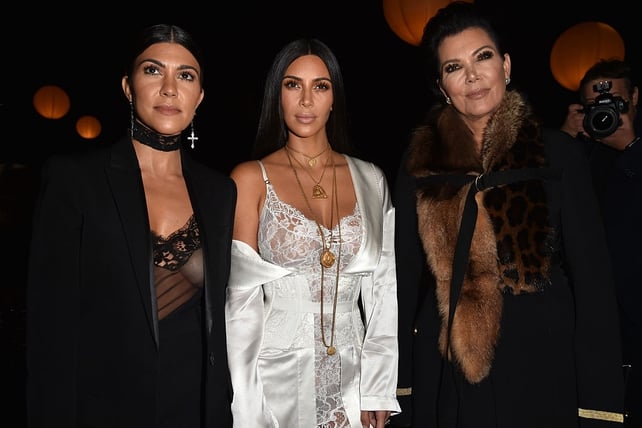 Kourtney and Kim Kardashian and their mum Kim Jenner during Paris Fashion Week