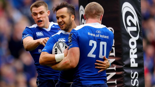 Leinster’s Garry Ringrose and Dan Leavy celebrate with Jamison Gibson-Park after he scored his side's third try against Munster
