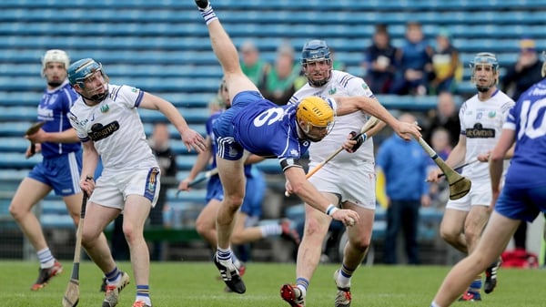 Sarsfields' Padraic Maher takes a tumble while claiming posession