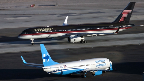 Donald Trump's plane passes Hillary Clinton's campaign plane at McCarran International Airport on the eve of the debate