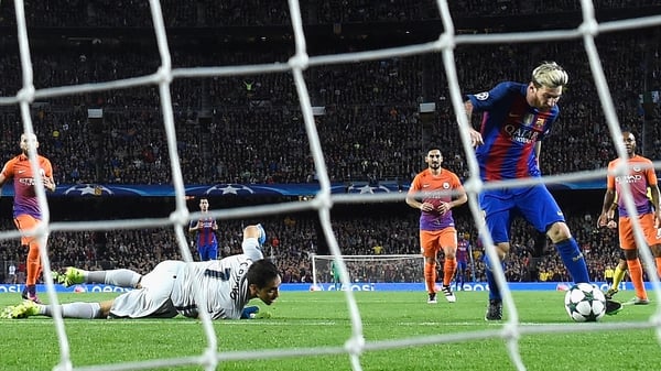 Lionel Messi strokes the ball home to put Barcelona 1-0 up