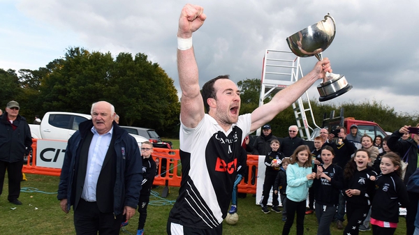 Kiernan's captain Adrian Moyles lifts the cup (Pic credit: Malcolm NcNally/Irish Post)