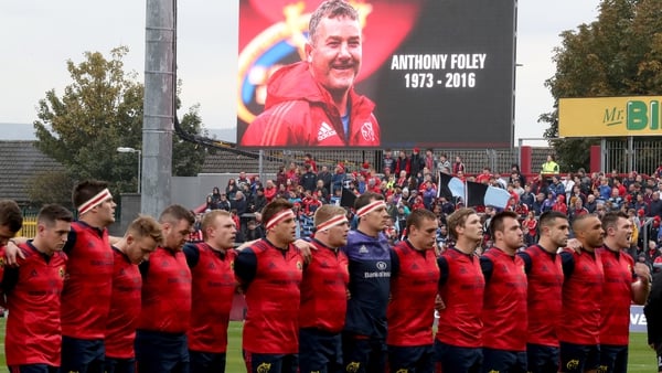 Munster players observe a minutes silence before kick-off against Glasgow Warriors