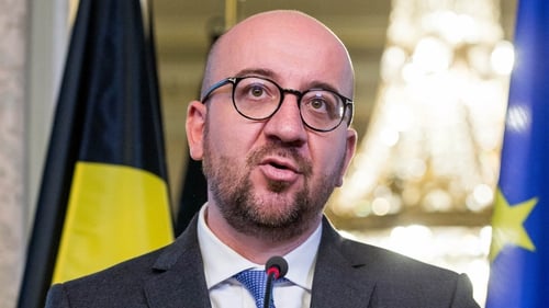 The departures leave Prime Minister Charles Michel as the head of a minority government