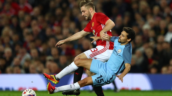 Luke Shaw (l) has received strong criticism from Jose Mourinho