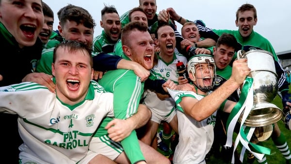 O'Loughlin Gaels players toast their success