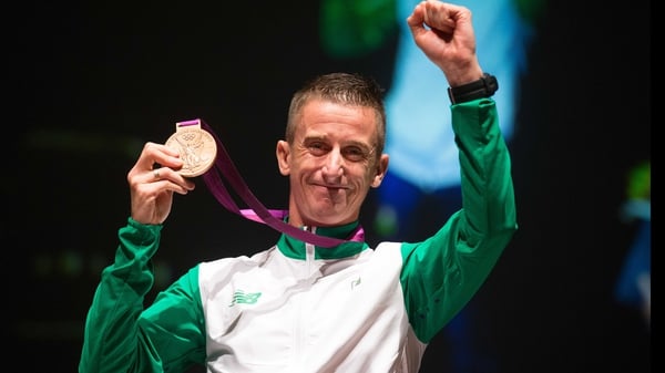 Rob Heffernan salutes the crowd as he receives his bronze medal