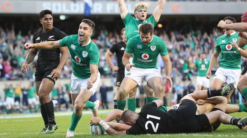 Conor Murray celebrates Robbie Henshaw's try in Ireland's historic victory