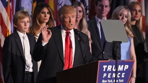Donald Trump and his family on stage in New York following his victory