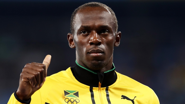 Usain Bolt has ambitions to be a professional footballer